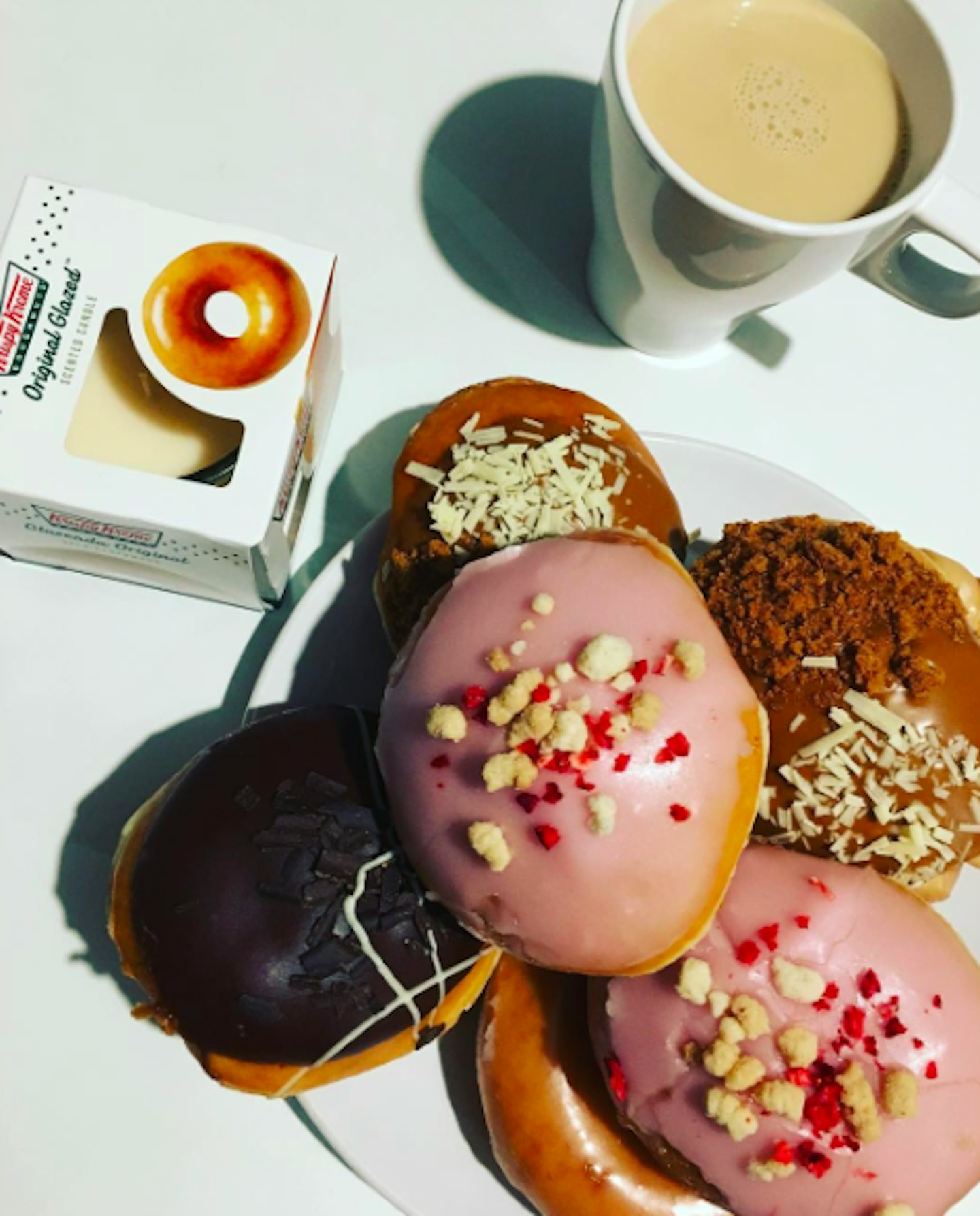 Stop everything. You can now buy Krispy Kreme scented candles heat